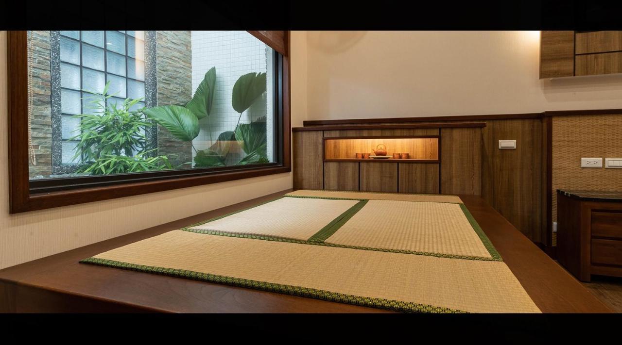 Appartement 山花映水紅莊園民宿 à Yuemei Extérieur photo