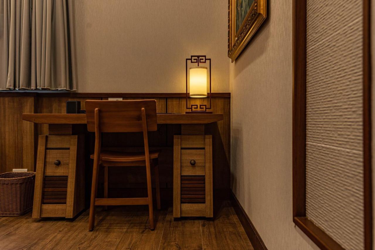 Appartement 山花映水紅莊園民宿 à Yuemei Extérieur photo